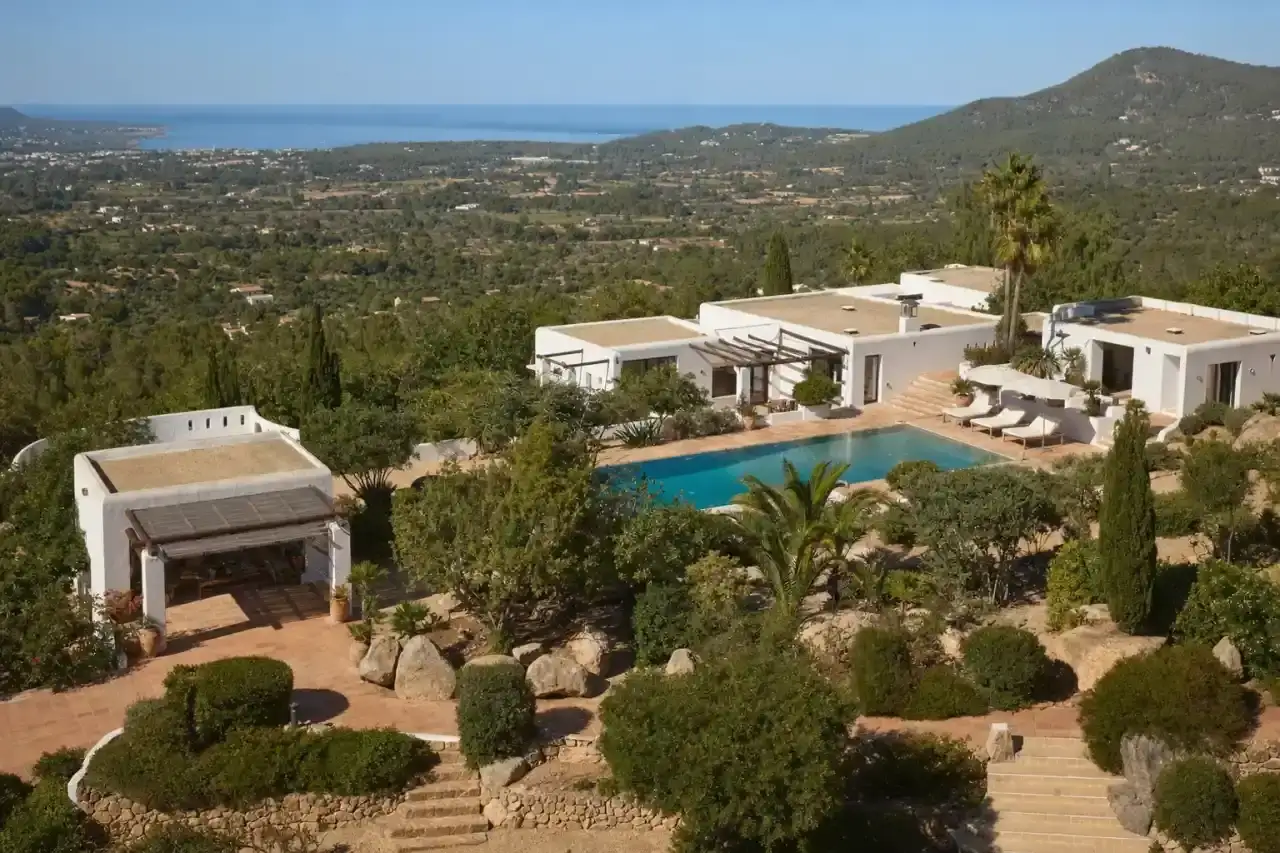 Aerial view of a luxury villa in Ibiza with designer pool and Mediterranean garden